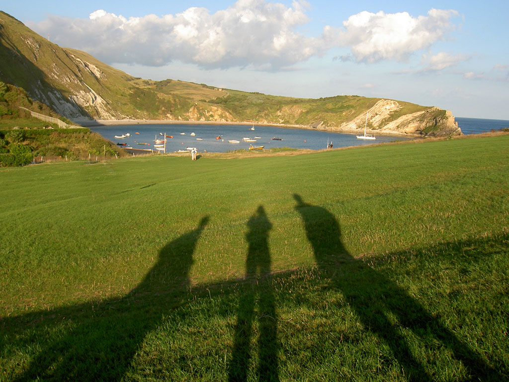 the village green at Lulworth Cove is a lovely place to take in the view of its famous horse shoe shaped beach
