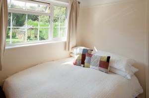 back bedroom with garden views at The Pink House Lulworth Dorset holiday home accomodation