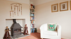 wood burning stove in both lounges at The Pink House Lulworth Dorset self catering accomodation