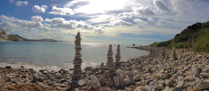 pebble statues at Mupe Bay ©The Pink House Lulworth holiday home accommodation sleeps 8